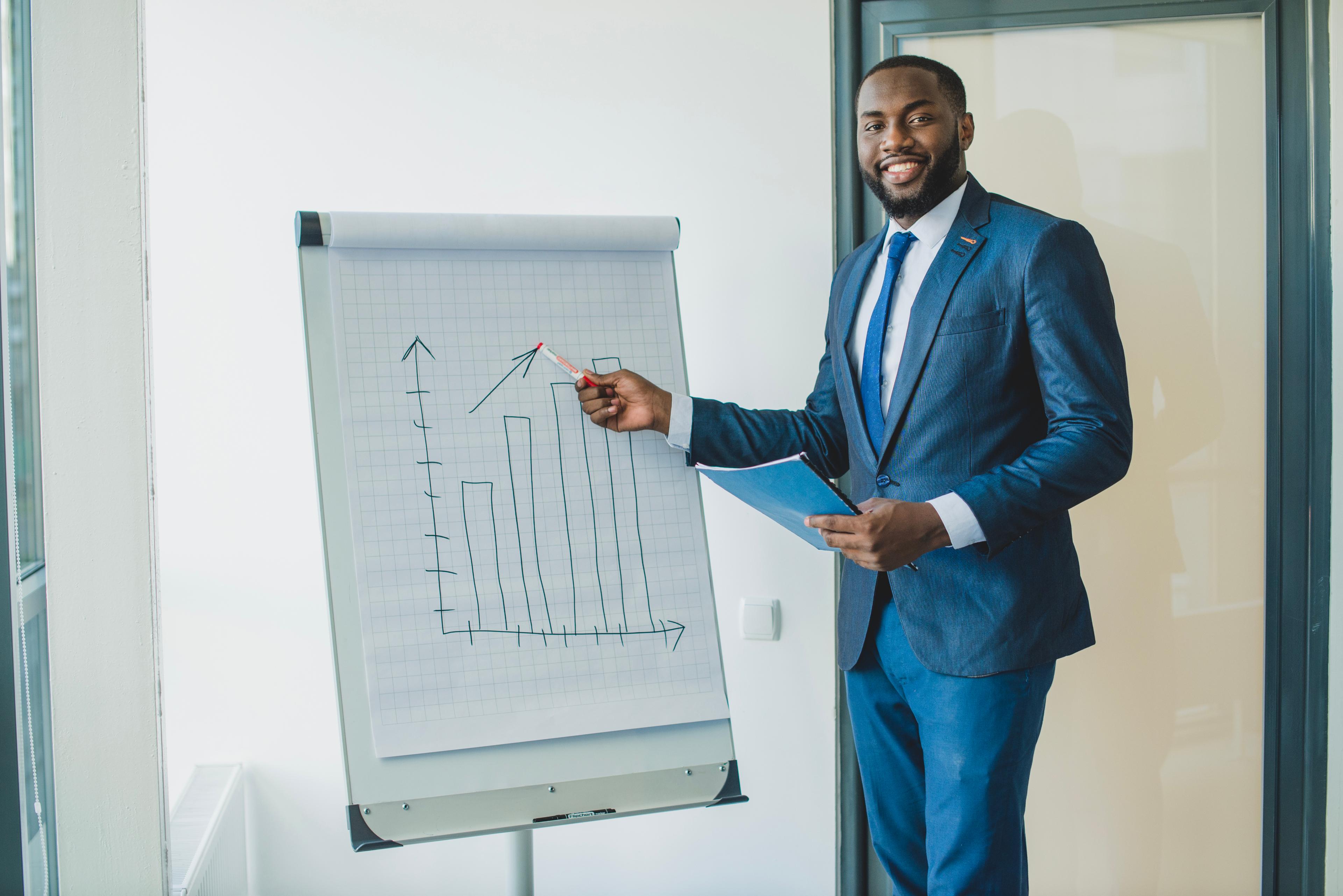 A business man showing graph